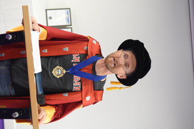 Glenn Lyons wearing academic robes